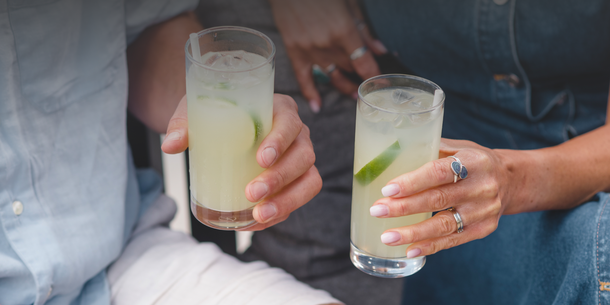 Two people sharing Luscombe  Non Alcoholic Organic Drinks 